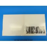 The Beatles “White Album” (2xLP, stereo, complete with poster and 4x photos).