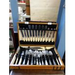 A Robinsons of Sheffield cutlery set in wooden case,