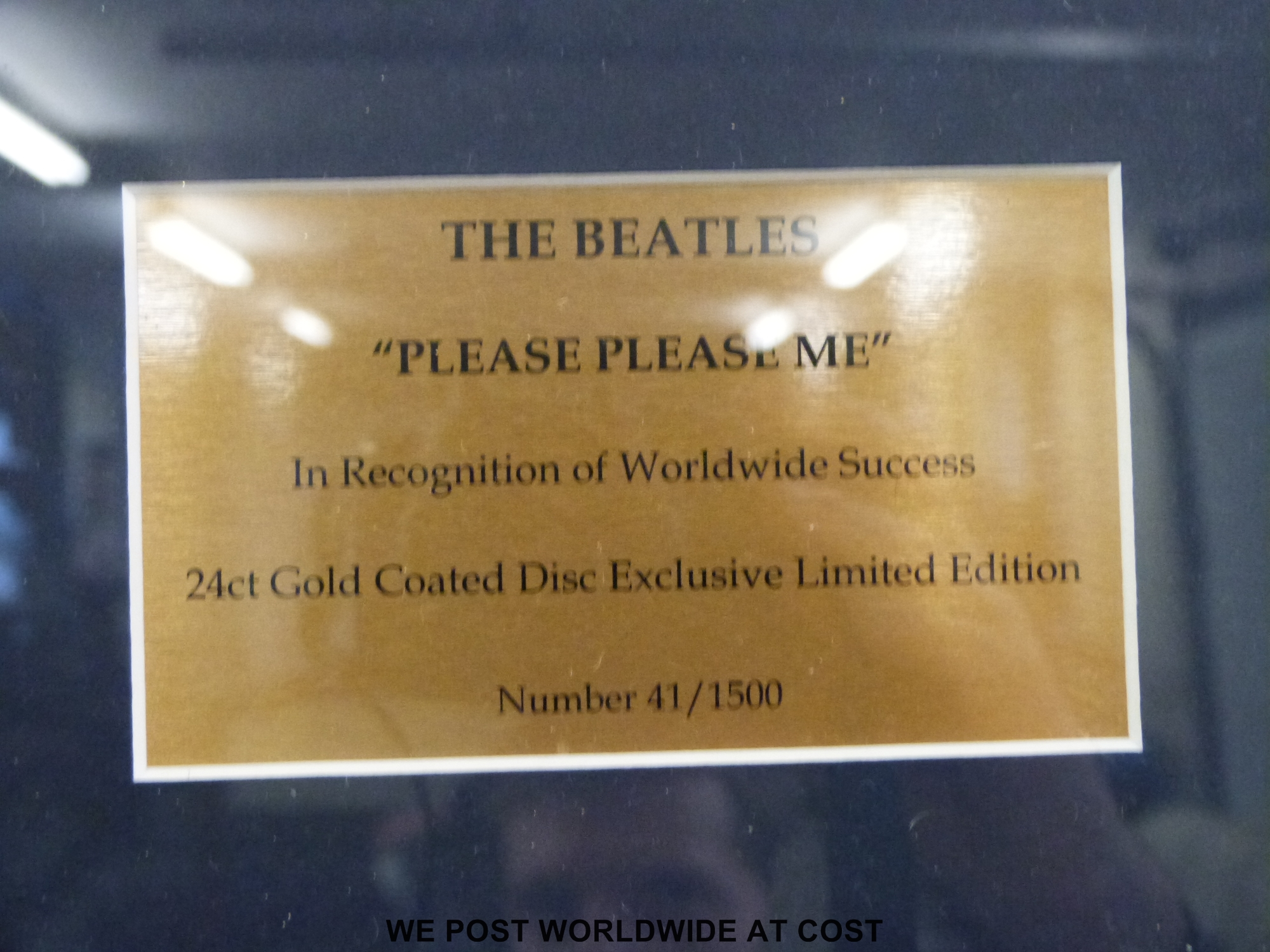 A framed (18” x 23”) “Gold” disc of The Beatles “Please Please Me” LP. - Image 3 of 4