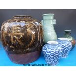 A collection of Chinese and Korean ceramics to include a large jar decorated with symbols,