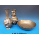 Two Chinese bronze vases with dragon decoration together with a bowl