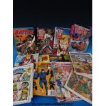 A collection of annuals and comics to include 'Battle' 1983, 84, 85, Victor 1983 and '2000 AD'.