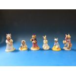 A collection of Royal Doulton Bunnykins figures comprising "Seaside Bunnykins" (DB177);