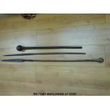 A vintage knobkerrie (75cm long) and two African spears with leather bindings,