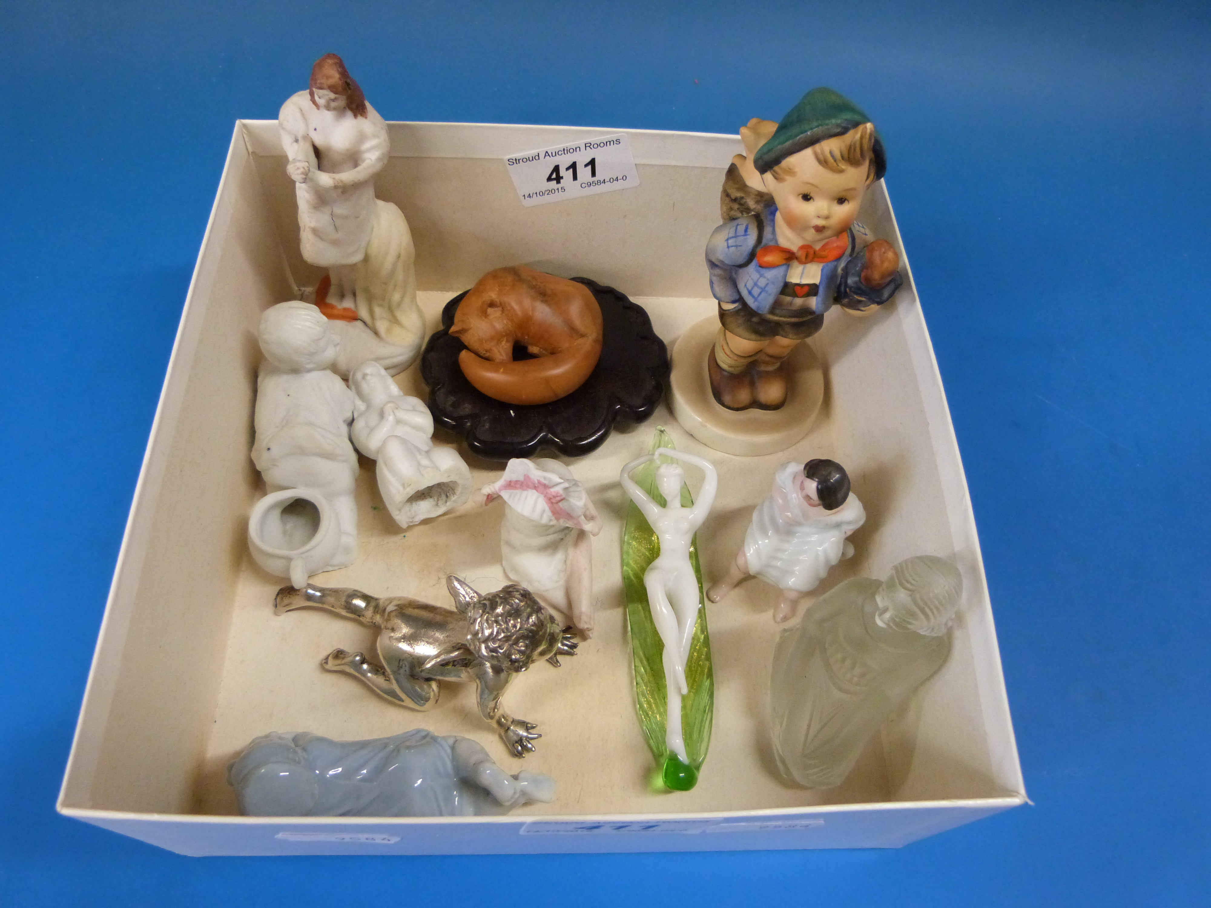 A collection of bisque and glass small figures,
