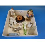 A collection of bisque and glass small figures,