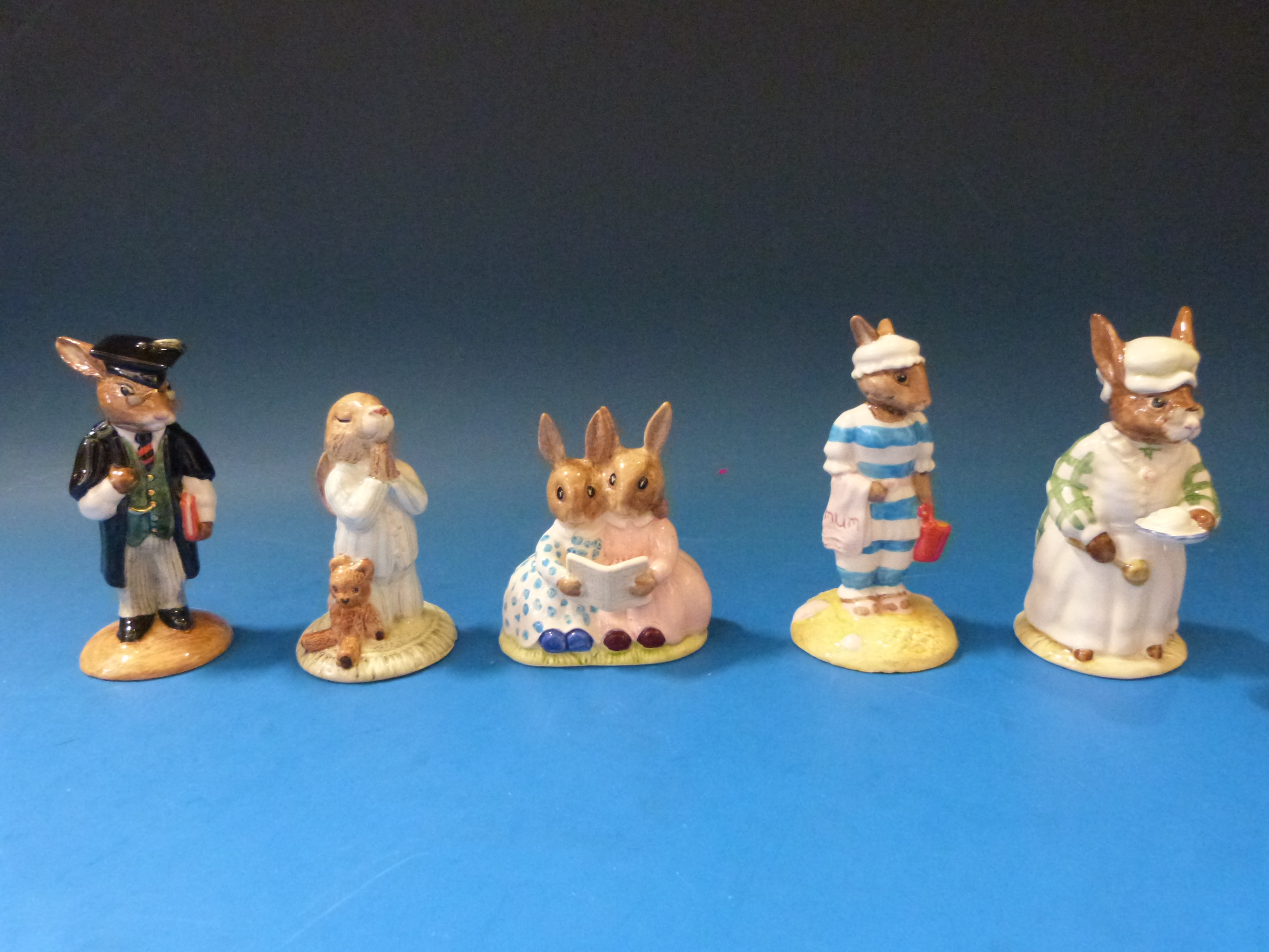 A collection of Royal Doulton Bunnykins figures comprising "Mother" (DB183); "Cook" (DB85);