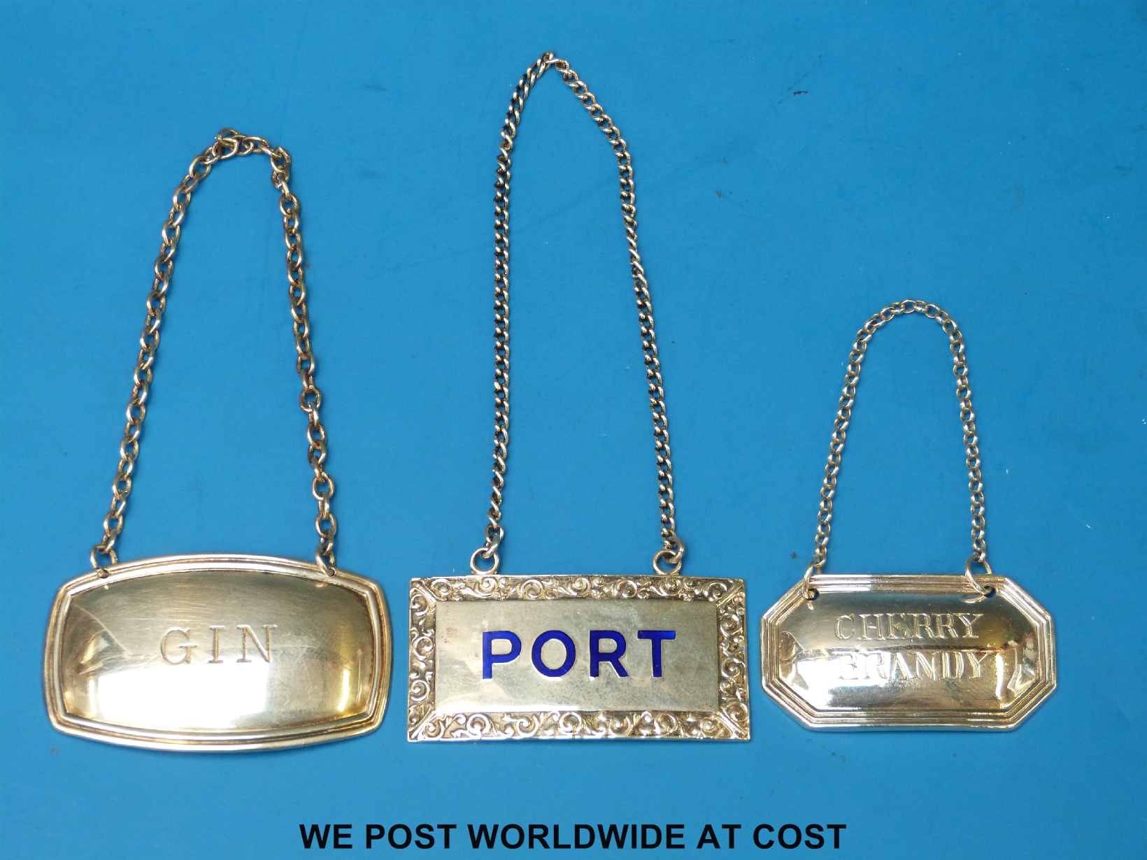 A George V hallmarked silver and blue enamel Port bottle label, B'ham 1924 maker T & S,
