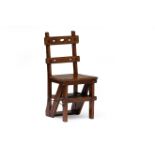 A Victorian mahogany metamorphic library chair the back with two cross-bars pierced and moulded with