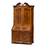 A German rosewood and walnut parquetry bureau-cabinet, 18th century the swan-neck pediment above a