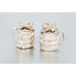 A pair of Elizabeth II silver mustards, C J Vander Ltd, London, 1996 each modelled as an open-