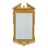 A George II style giltwood mirror with broken triangular pediment above a bevelled rectangular plate