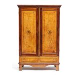 A West Coast cedarwood and stinkwood inlaid cupboard, 19th century with outset moulded top above a