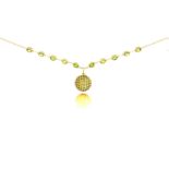 Peridot pendant necklace the textured gold spherical pendant inlaid with peridots, to a gold bale