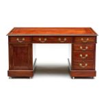 A mahogany pedestal partners' desk, 19th century the rectangular top inset with a gilt-tooled