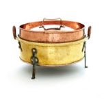 A copper and brass tart pan, 19th century the brass body with folded rim, sides applied with a