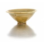 A Chinese celadon-glazed bowl, Song Dynasty (960-1279) conical, raised on a low foot, covered