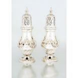 A pair of Edward VII silver casters, Lambert & Co, London, 1909 each baluster body chased and