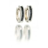 Pair of black and white diamond hoop earrings claw-set to the front with round brilliant-cut