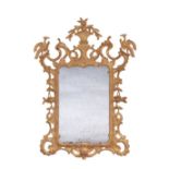 A George III style giltwood looking glass, 19th century the rectangular mirror plate within a