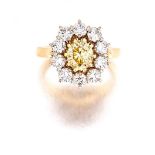 Diamond dress ring, David Thomas, London "claw-set to the centre with a vivid fancy yellow oval-