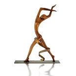 A Hagenauer wood and copper figure of a Dancer, circa 1950 minor repair to her right hand,