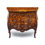 A Dutch walnut marquetry commode, 19th century the serpentine top with canted corners above three
