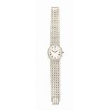 Lady's 18ct white gold wristwatch, Piaget, 1980s the silvered oval dial with roman numerals, the