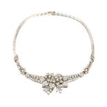 French diamond necklet designed as a floral spray with articulated drops flanked by leafy