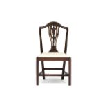 A Neo-Classical mahogany and part-painted side chair, 18th century the arched top carved with a