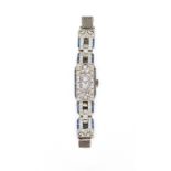 Edwardian lady's sapphire and diamond cocktail watch the rectangular silvered dial with blue