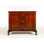 A Cape teak side cupboard, late 18th century the moulded rectangular top above a pair of fielded