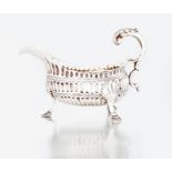 A George III silver sauceboat, London, probably William Cripps, 1766 the body later chased with