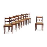 A set of nine Cape stinkwood side chairs, 19th century each with reeded top-rail above a bow-