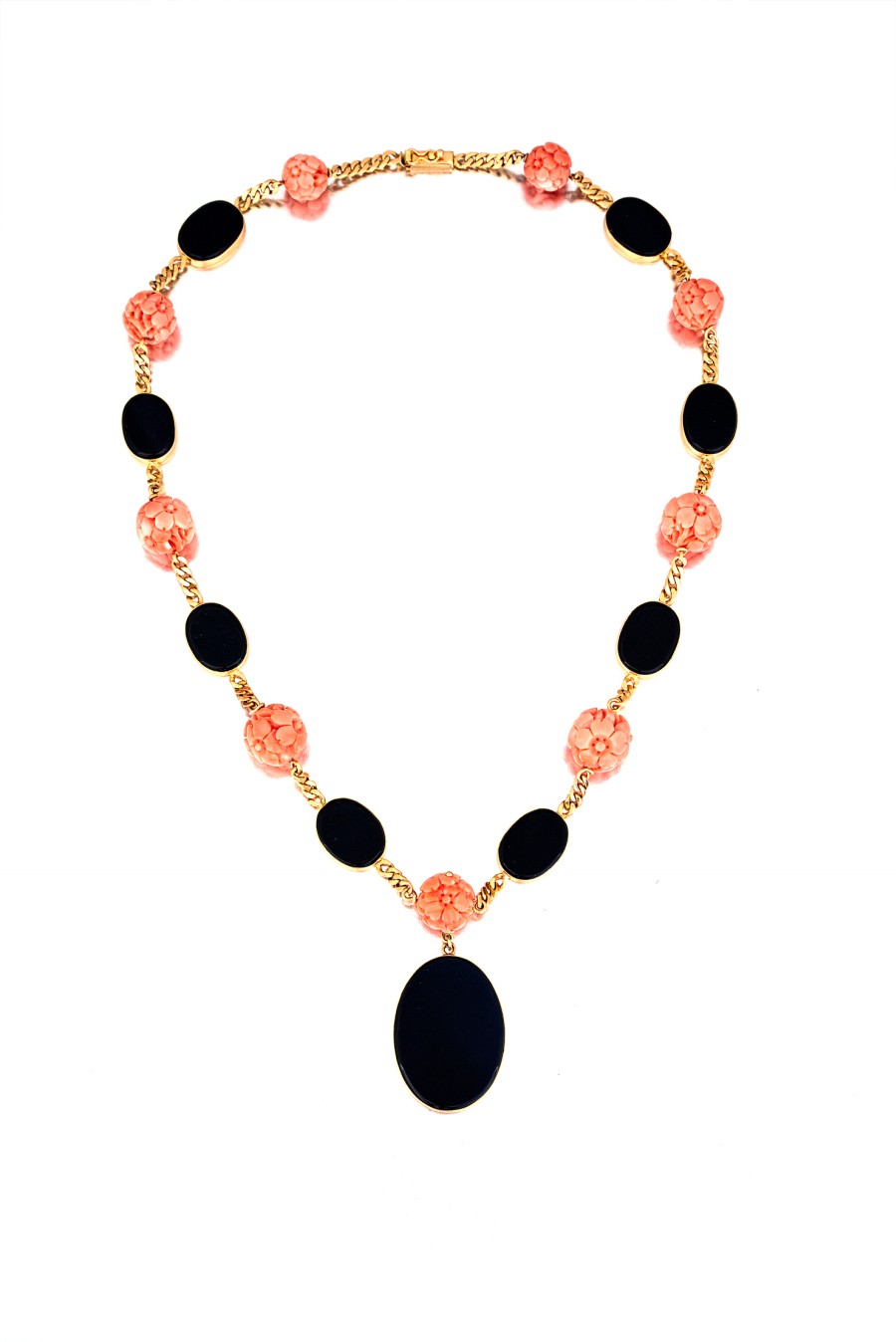 Onyx and coral necklace "composed of alternating collet-set oval onyx plaques and flowerhead-