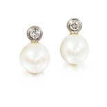 Pair of South Sea pearl and diamond earrings the pearls measuring approximately 15.50mm surmounted