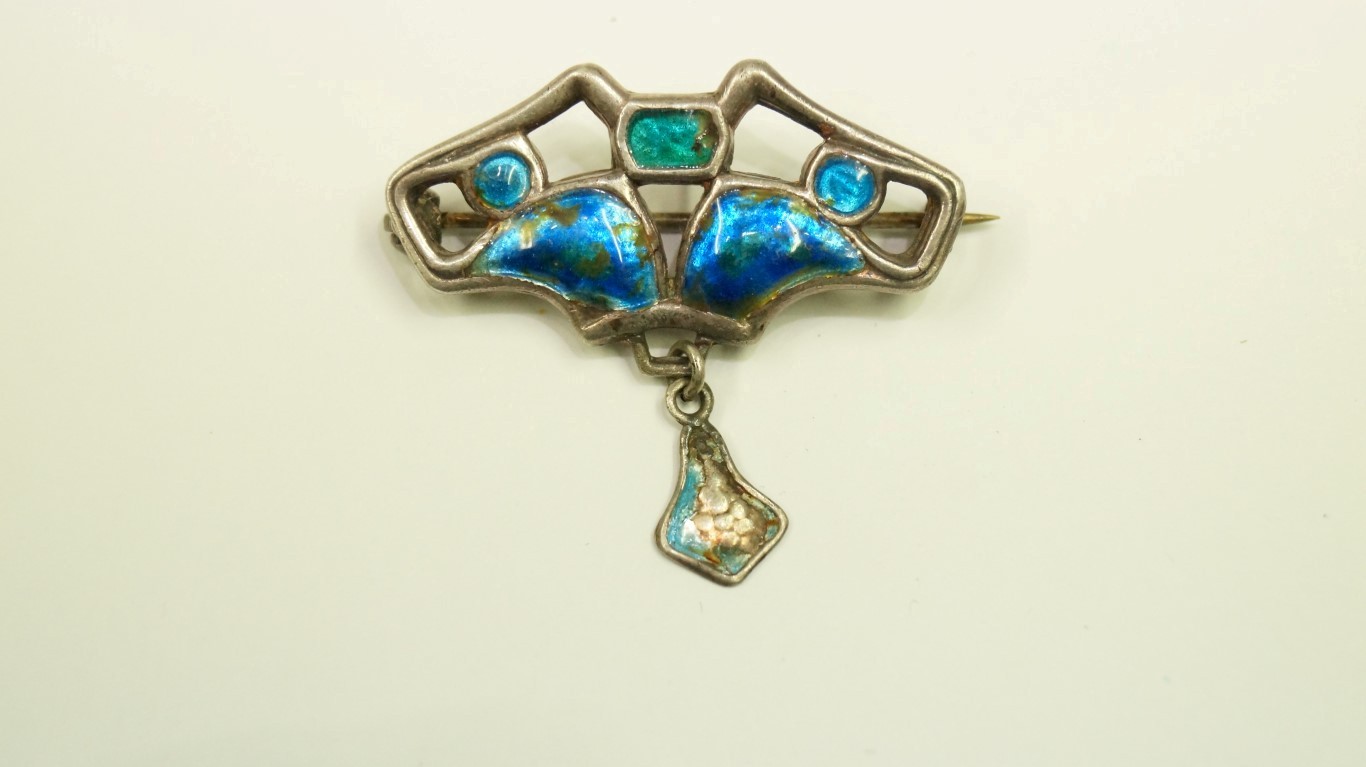 An Art Nouveau silver and enamel brooch, by Charles Horner, Chester 1908, 3.5cm. Condition Report: