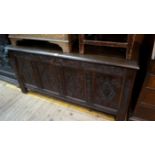 A 17th century carved oak panelled coffe