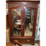 An Art Nouveau mahogany double wardrobe,