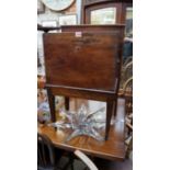 A antique mahogany cellarette on stand,