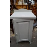 An old grey painted pot cupboard having