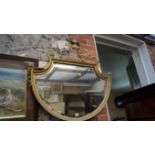 An Adam style gilwood framed wall mirror