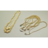 A simulated ivory graduated bead necklac