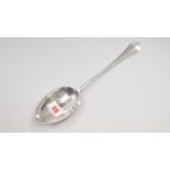 An Edwardian silver Hanoverian rat tail pattern silver gravy spoon, by Robert Stebbings, London