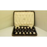 A cased set of twelve silver coffee spoo