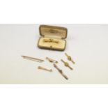 A selection of Victorian gold bar brooch