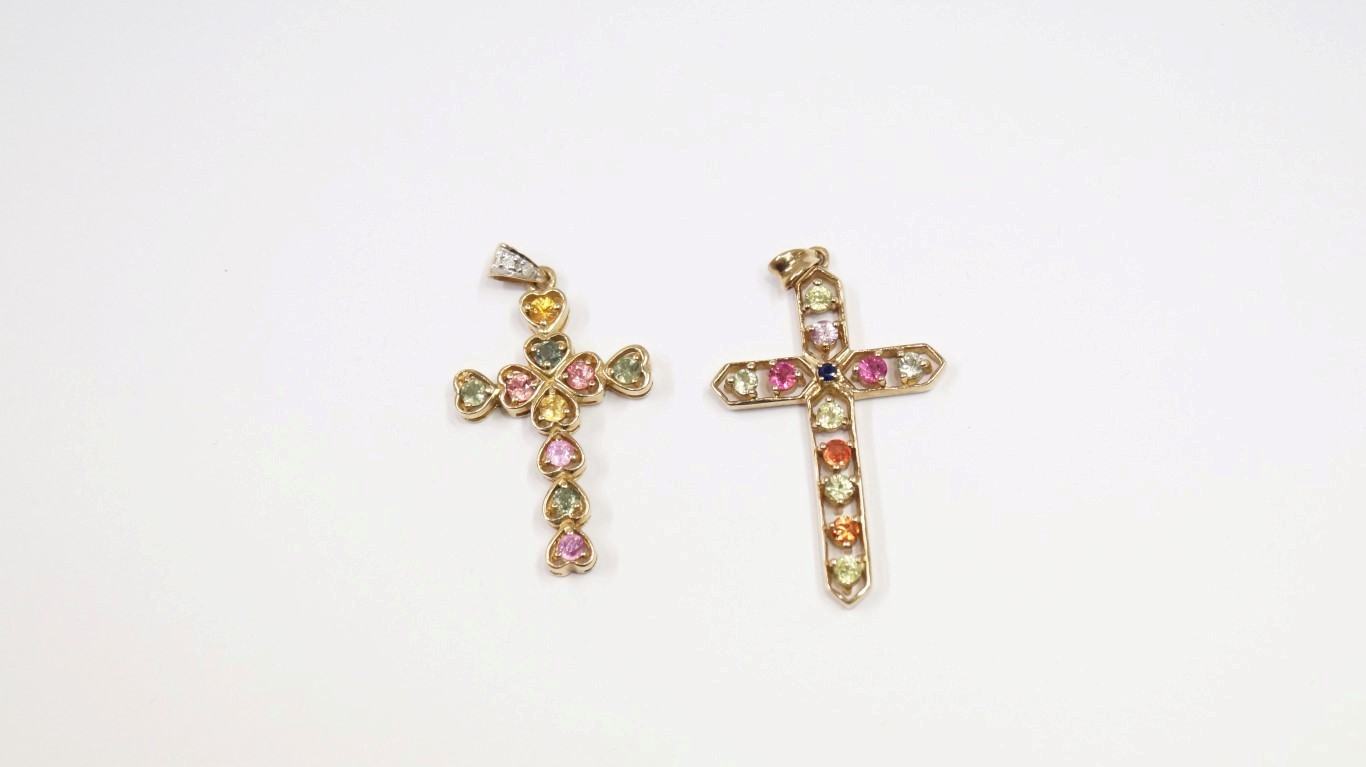 Two 9ct gold gem set pendant crosses.