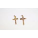 Two 9ct gold gem set pendant crosses.