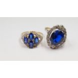 A 9ct gold ring set four blue topaz, and