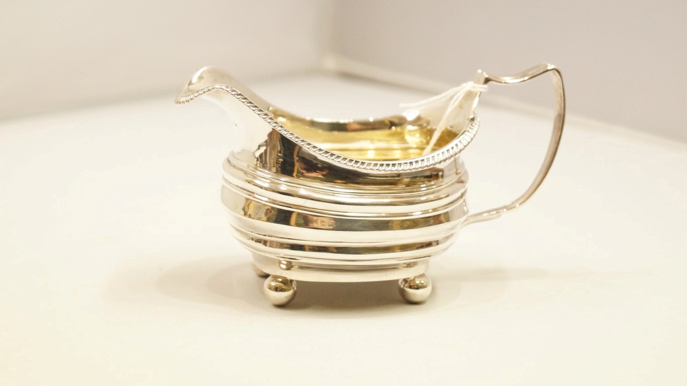 A George III silver milk jug, by Thomas